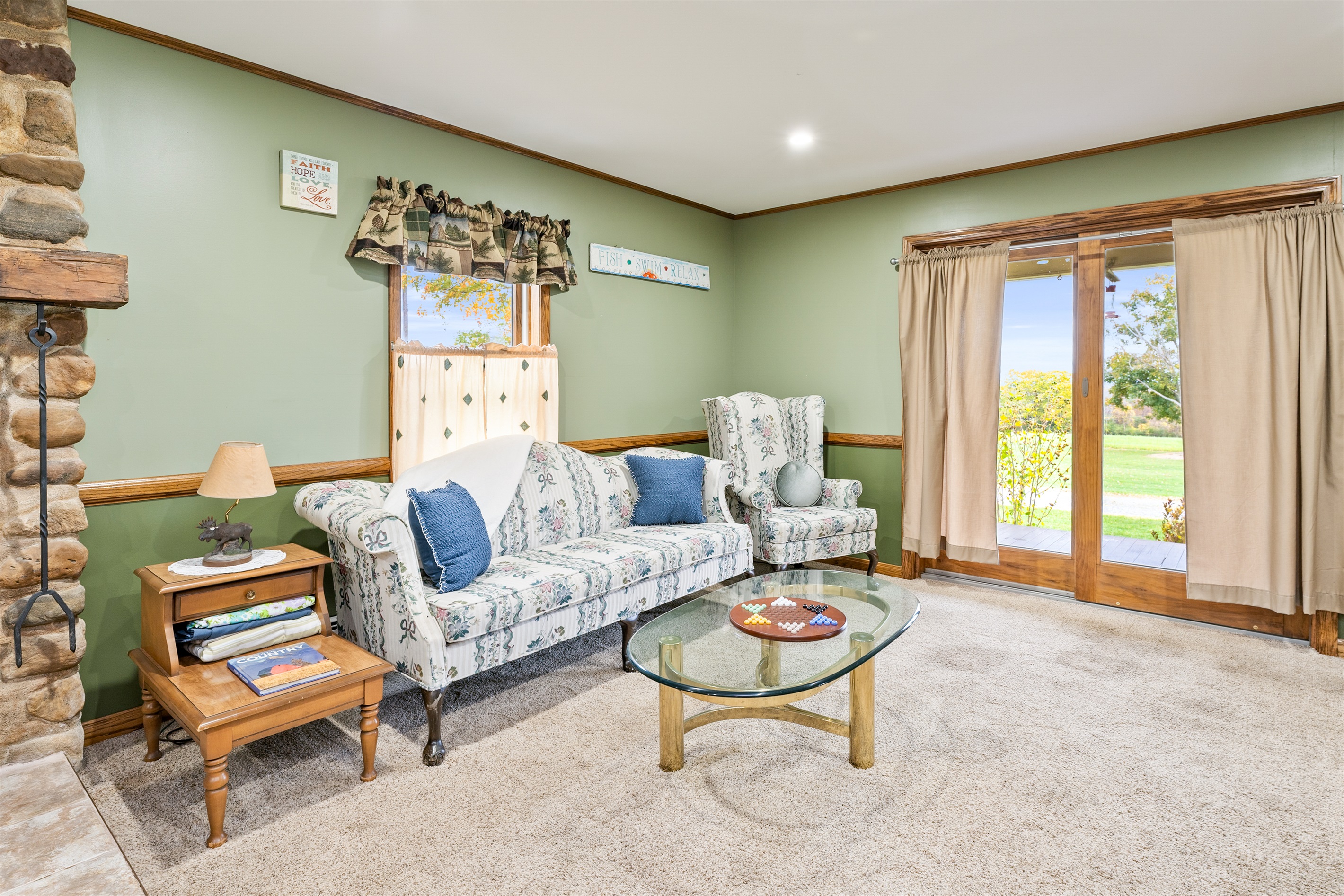 Spacious family room with comfortable seating and scenic views — gather and make memories here.