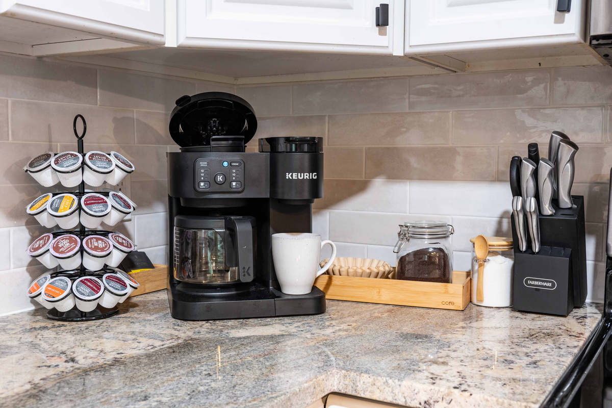 Kitchen: Brew your favorite coffee with our modern Keurig and enjoy culinary adventures!