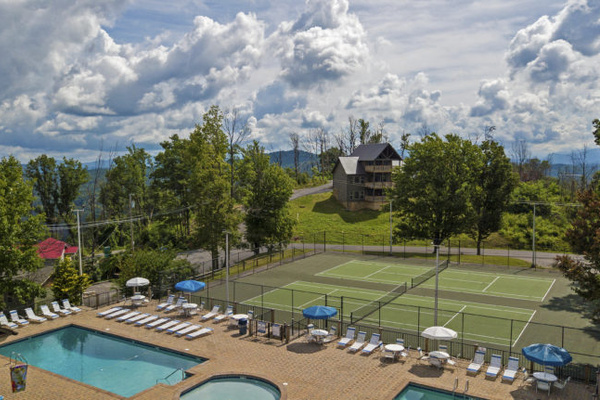 North Clubhouse, one of three pool recreation areas available to you during the season.  Enjoy the pools, view, tennis, pickleball or ping pong entertainment offered there!
