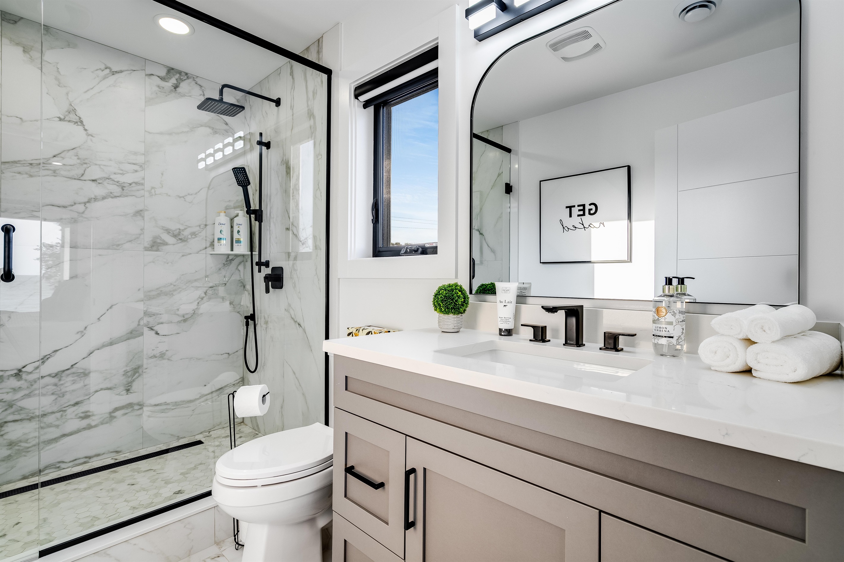 Full Bathroom, Matte and glossy surfaces create visual interest.
