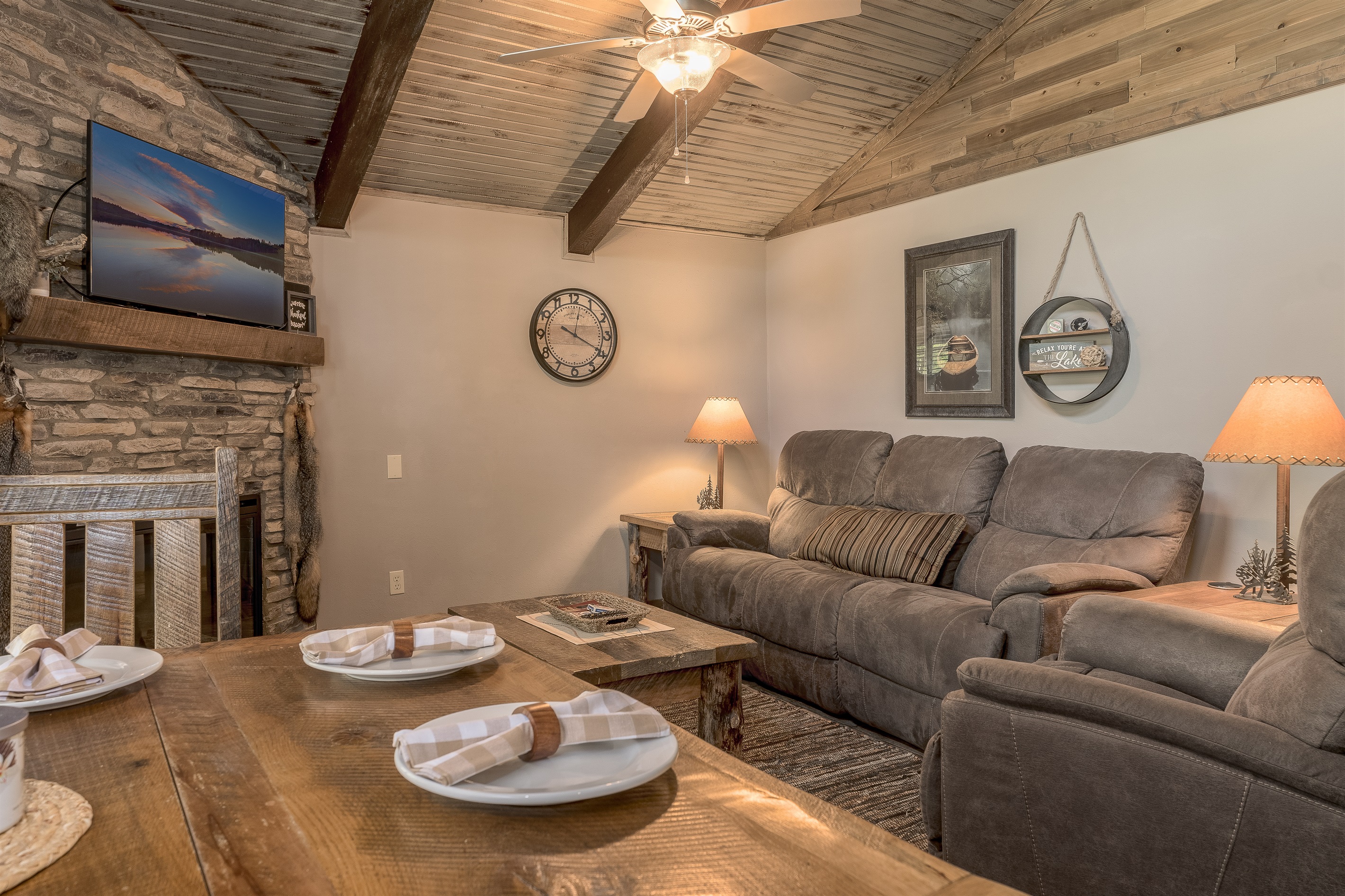 Living room with reclining sofa and fireplace