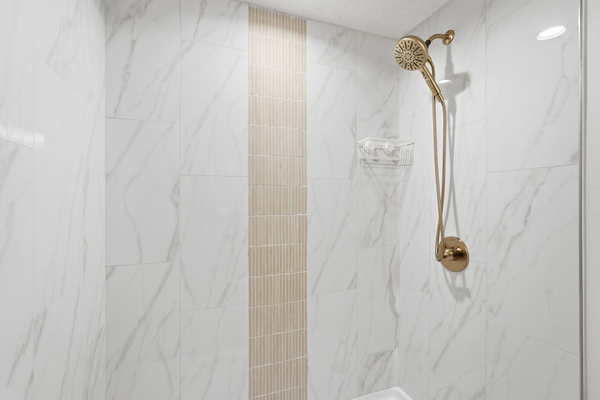 Primary ensuite bathroom has tiled walk-in shower with no step!