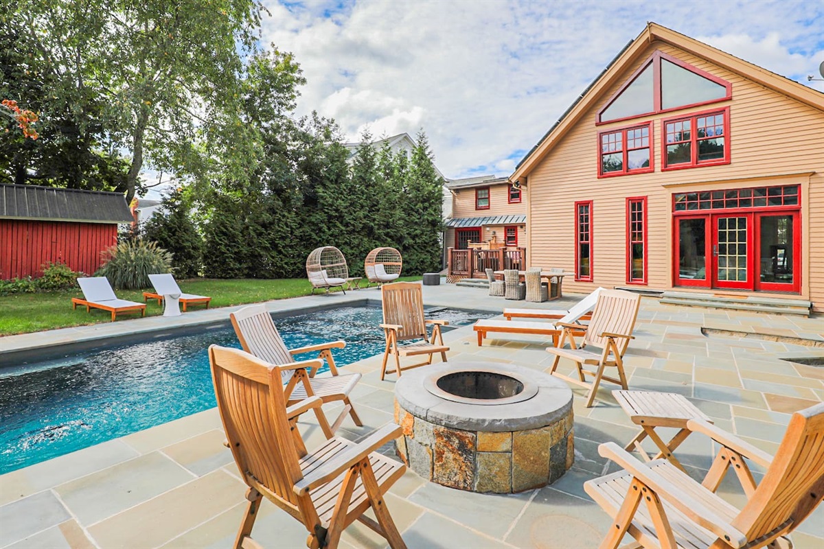 Outdoor area adjoining two homes with outdoor entertaining and lounging