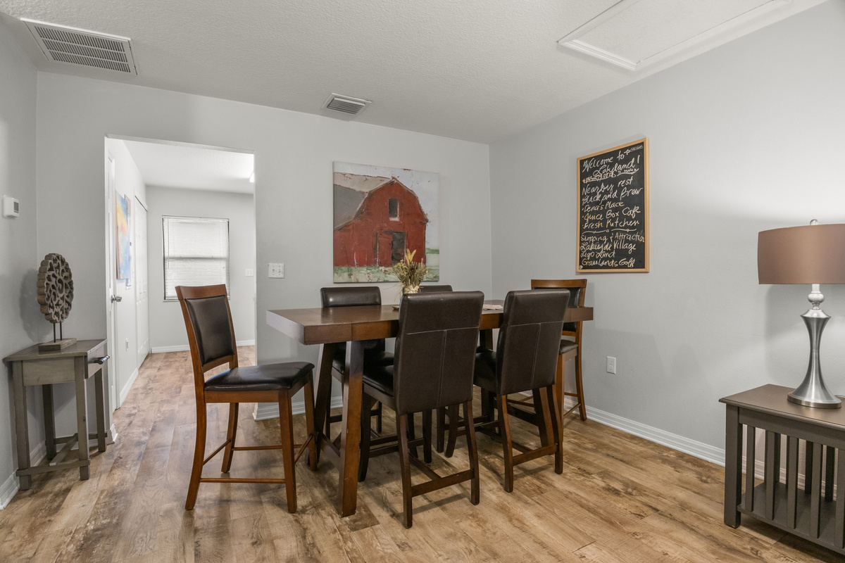 The dining room connects to the kitchen.