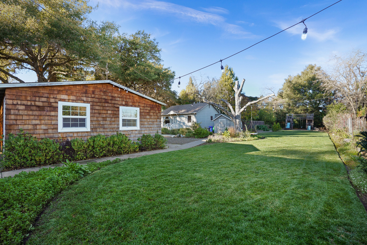 The spacious backyard offers plenty of room to relax, play, and enjoy the outdoors. Whether you're sipping your morning coffee, dining outside, or spending time with family and friends, it's the perfect place to unwind.