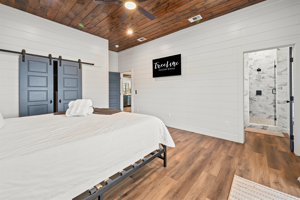 Soft lighting and a peaceful layout make this bedroom a great place to unwind, whether you&rsquo;re taking a nap or settling in for the night.