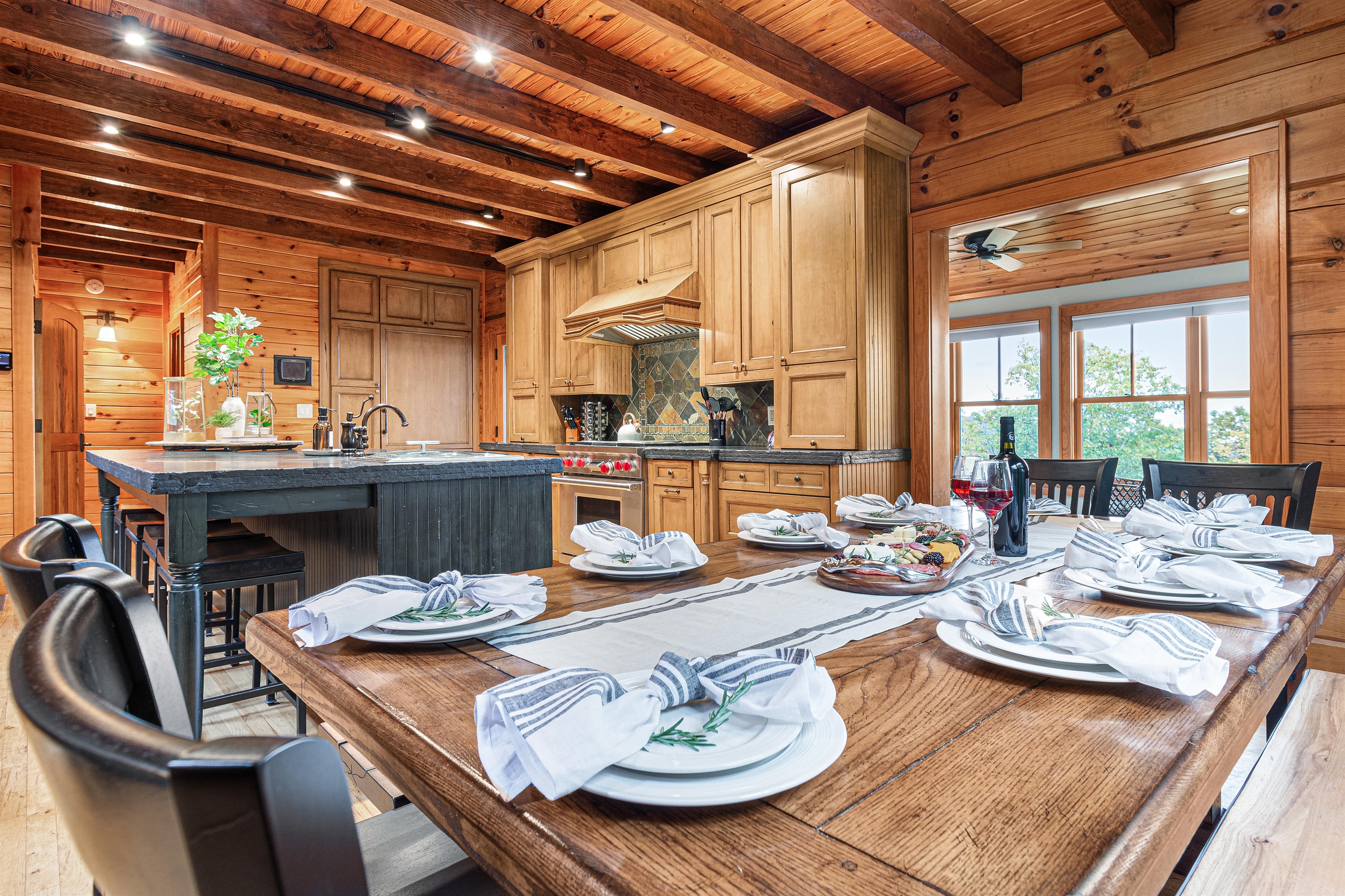 Dining table has two benches and two chairs to sit 10 guests.