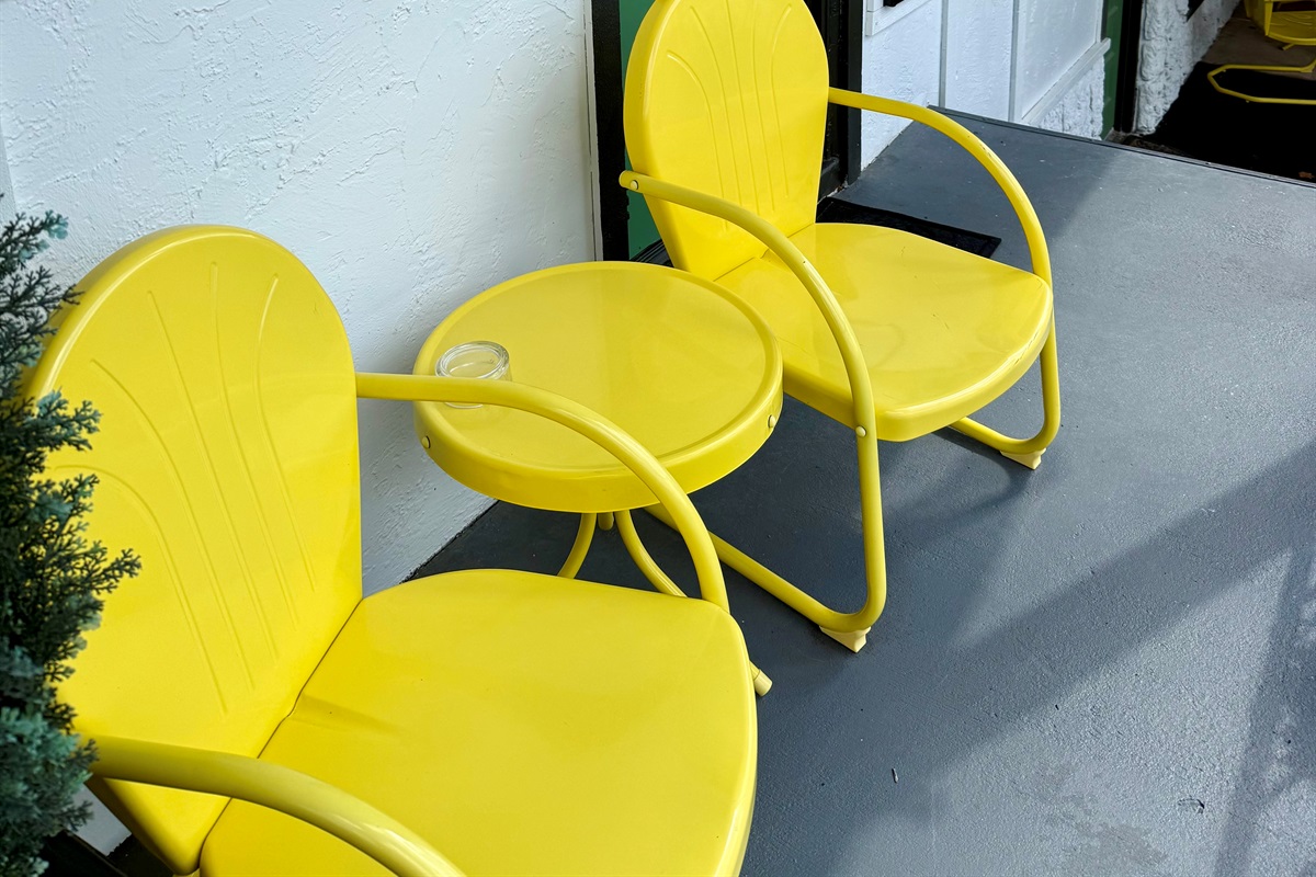 Outdoor seating by your room.