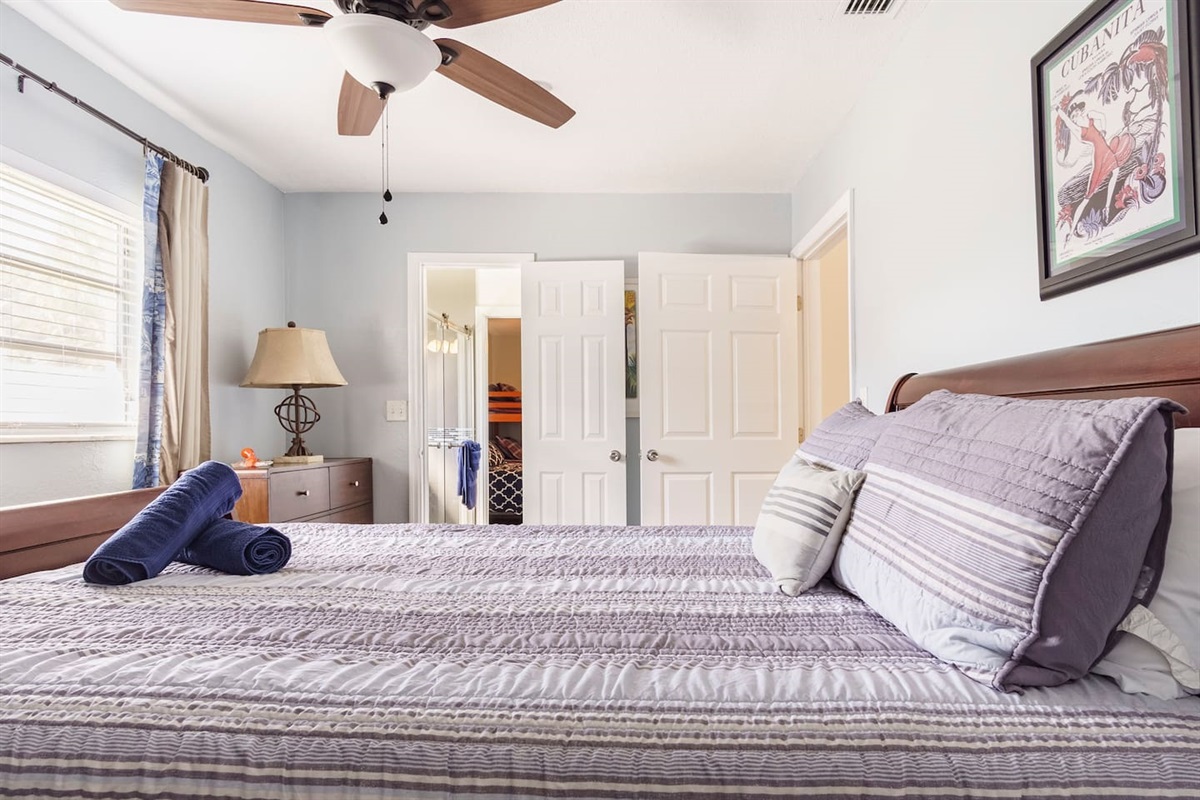 Bedroom #5 has queen-size bed and shares a “jack and  jill” bathroom with bedroom #4. Thisjack and jill bathroom has a newly tiled frameless shower, lots of natural light, and ample space. Wide doorway and walk-in closet.
