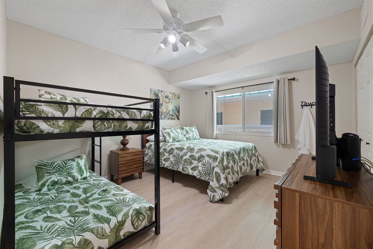 Bedroom 2: Queen & twin bunk beds, sleeps 4.