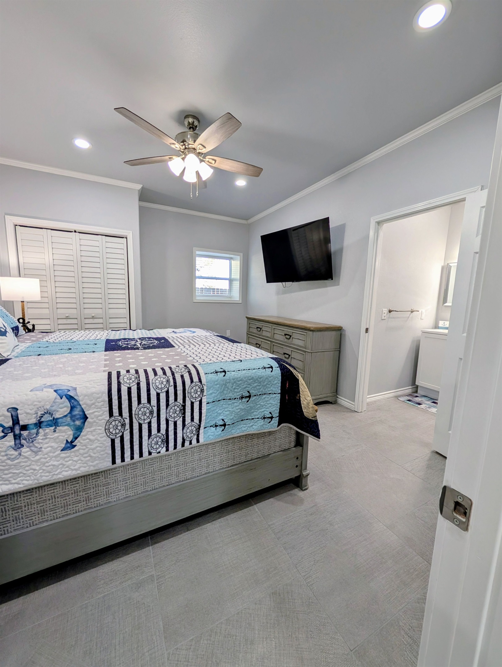 Bedroom two with beautiful coastal decor and smart tv
