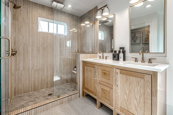 Ensuite bathroom for the main bedroom. Shower features 2 separate shower heads including an oversized rain shower head