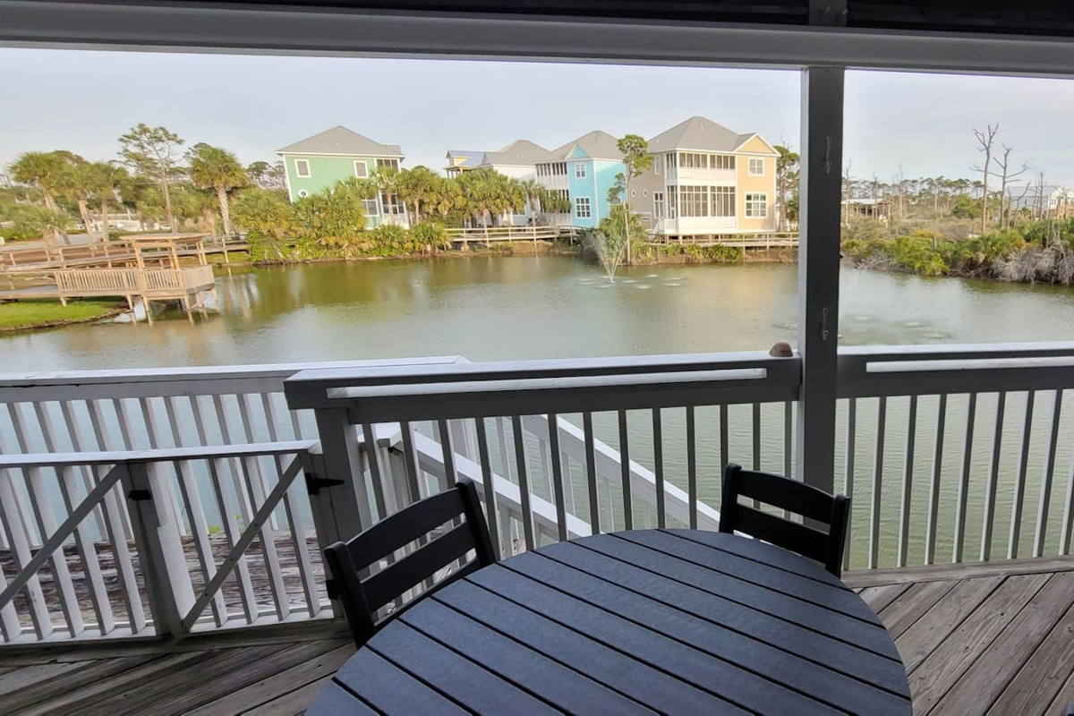 Your private main deck &mdash; Polywood table, lake view, and nothing but the sound of nature.