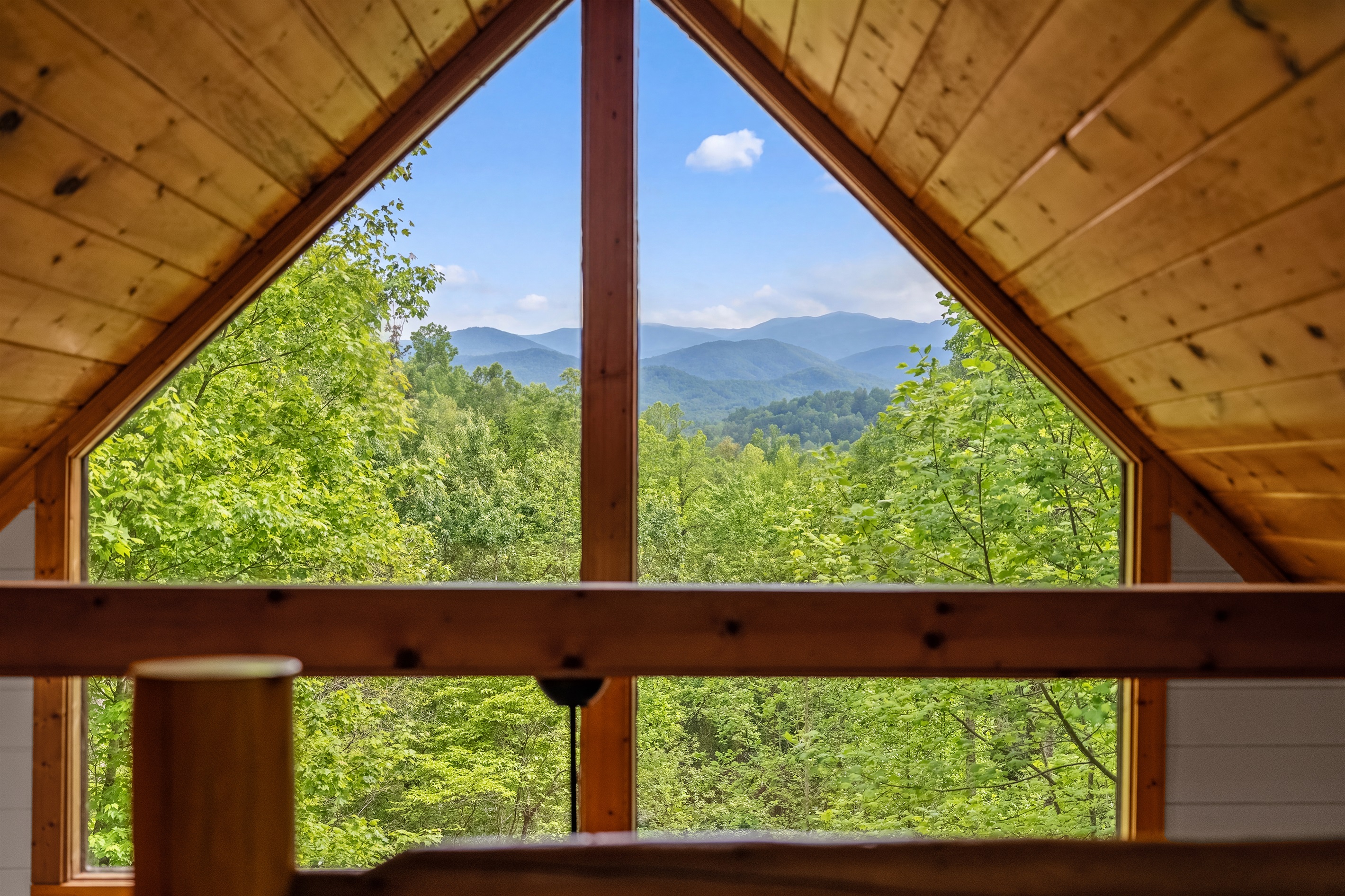 Framed southern views of Mt. Le Conte through the cabin's A-frame windows - nature at your doorsteps