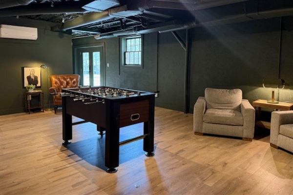 Enjoy a foosball table in the game area—perfect for relaxing, competing with friends, and unwinding after exploring Athens or a day at University of Georgia.