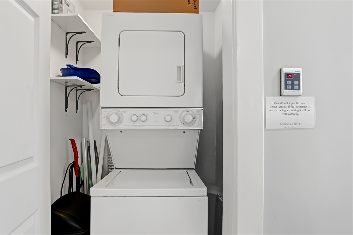 Conveniently tucked-away laundry adds ease for longer stays and guests.