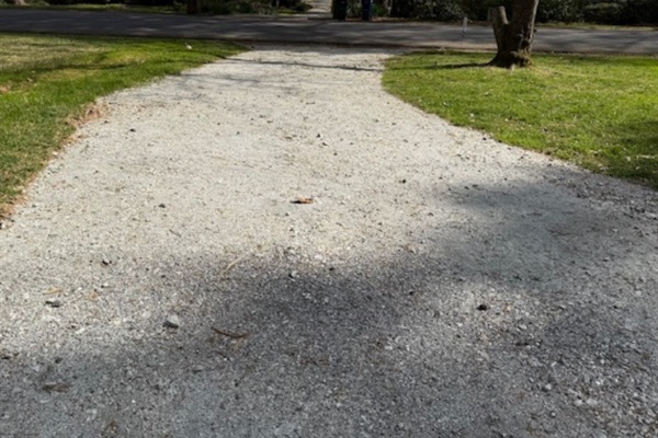 Gravel drive with parking available for two vehicles