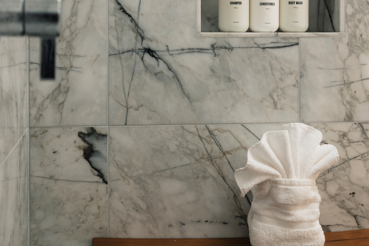 Luxury shower details 🫧 Stocked + styled for an elevated stay