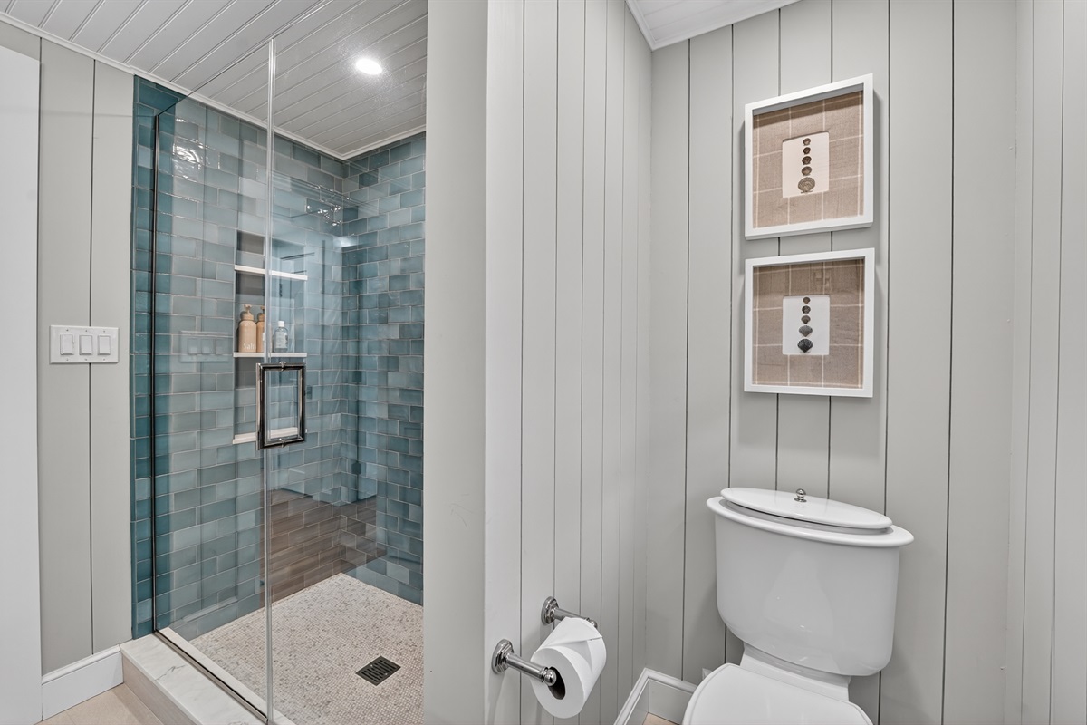 A clean and calming full bathroom on the second floor for your comfort.