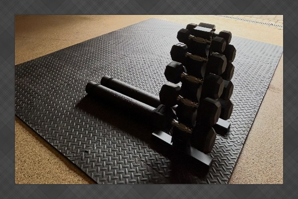workout equipment in garage (yoga matts, weights)