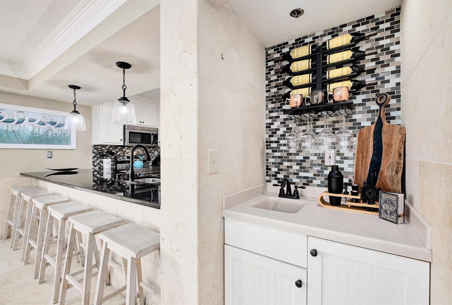 Bar top stools with wine bar.