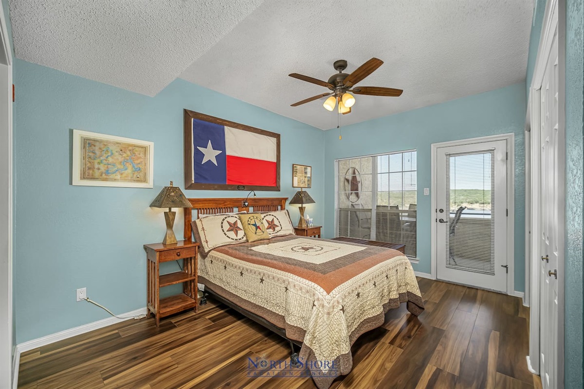Queen Bed in Bedroom with Patio Access