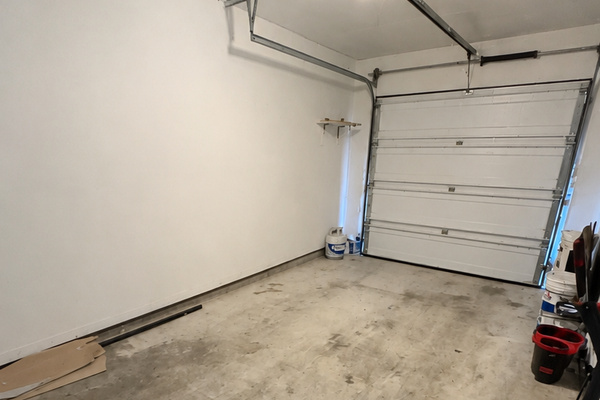 Inside of the ONE car garage- can fit a Ford Edge or smaller vehicle