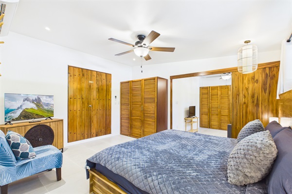Bedroom 3.  Brand new bedroom with a custom locally made king size bed and a smart tv.  This room offers so much flexibility!  It has it's own private entrance from the outdoor covered rancho, or double doors into bedroom 2 that can be locked for privacy. 
