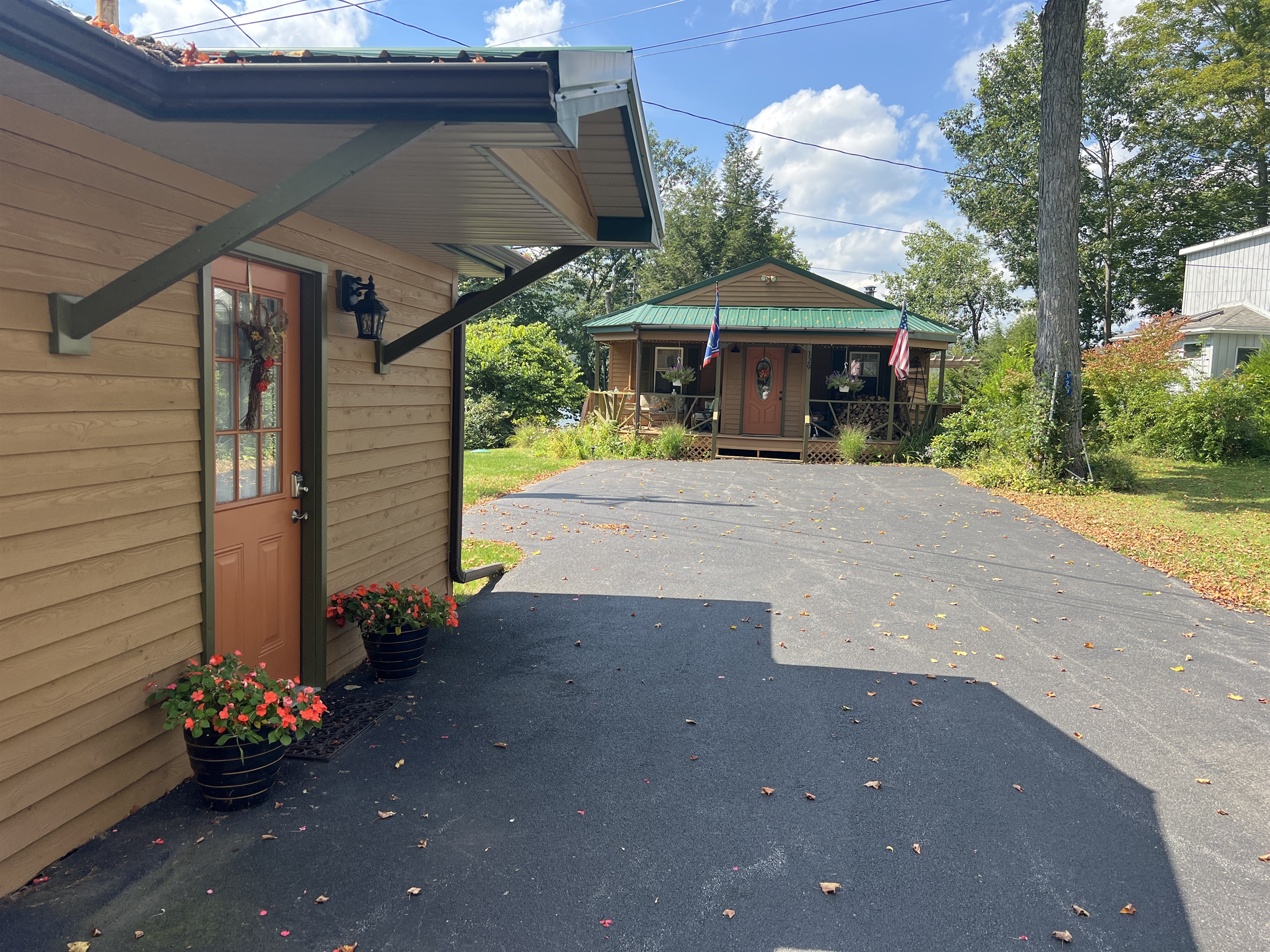 Lakeside Suite exterior. Lakeside suite is attached to the garage on the left. The main house to the right is occupied by your host.
