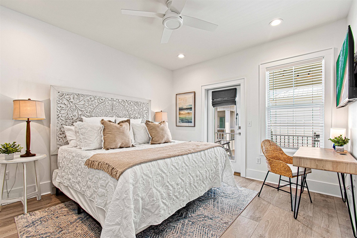 This King Bedroom offers private access to the upstairs balcony. It also has the desk for office work. It's our favorite space!
