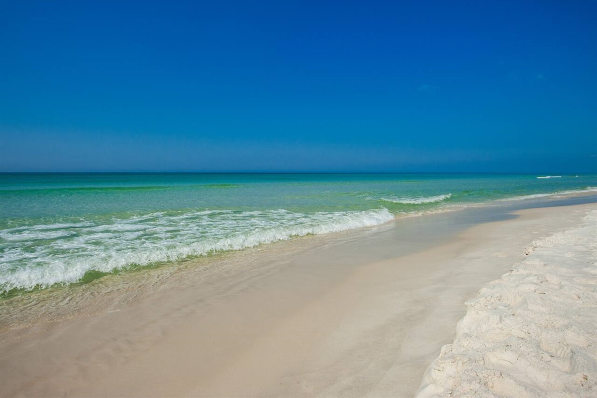 Walk to the emerald coast waters!