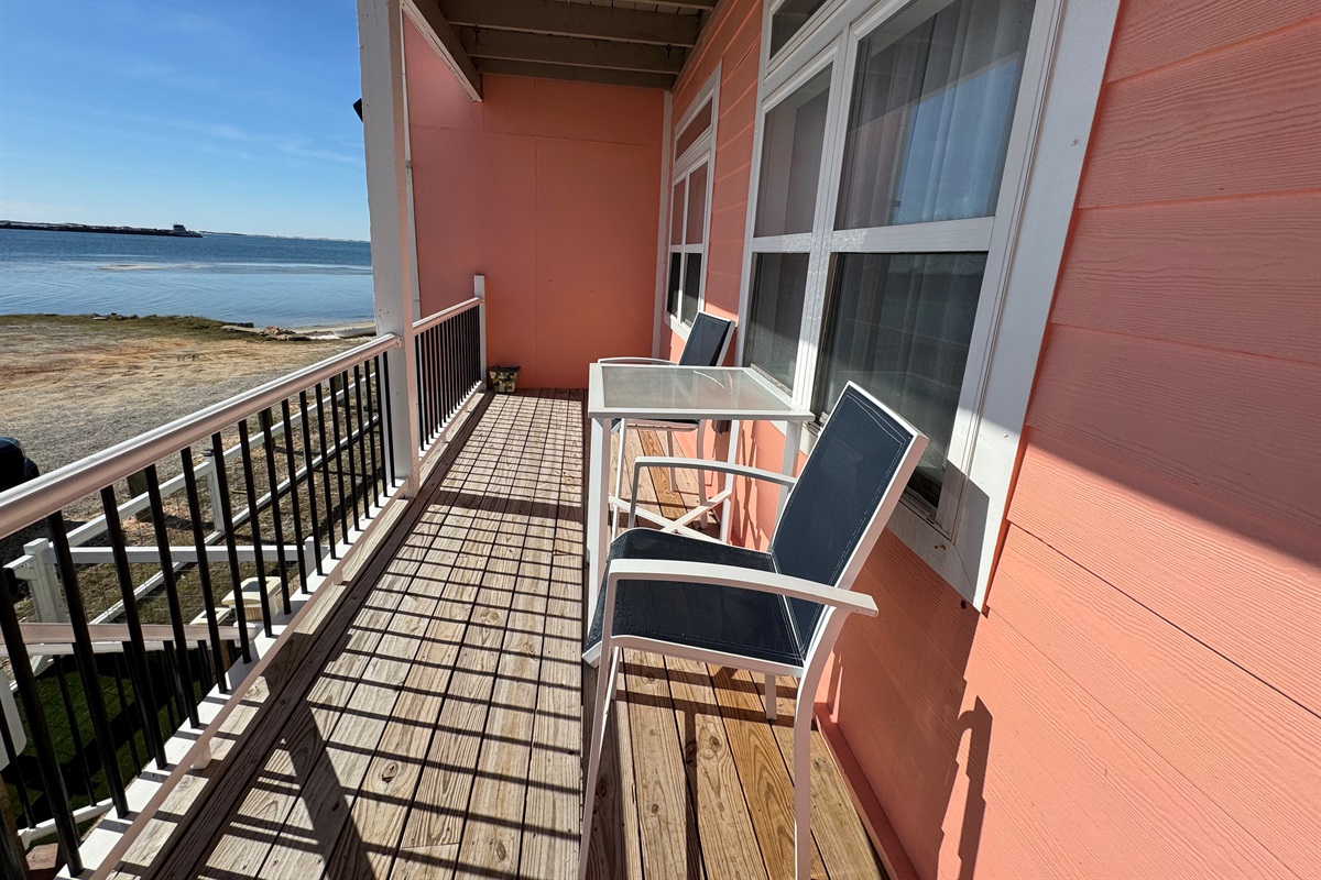 balcony with view of the marina, ocean and beautiful sunsets