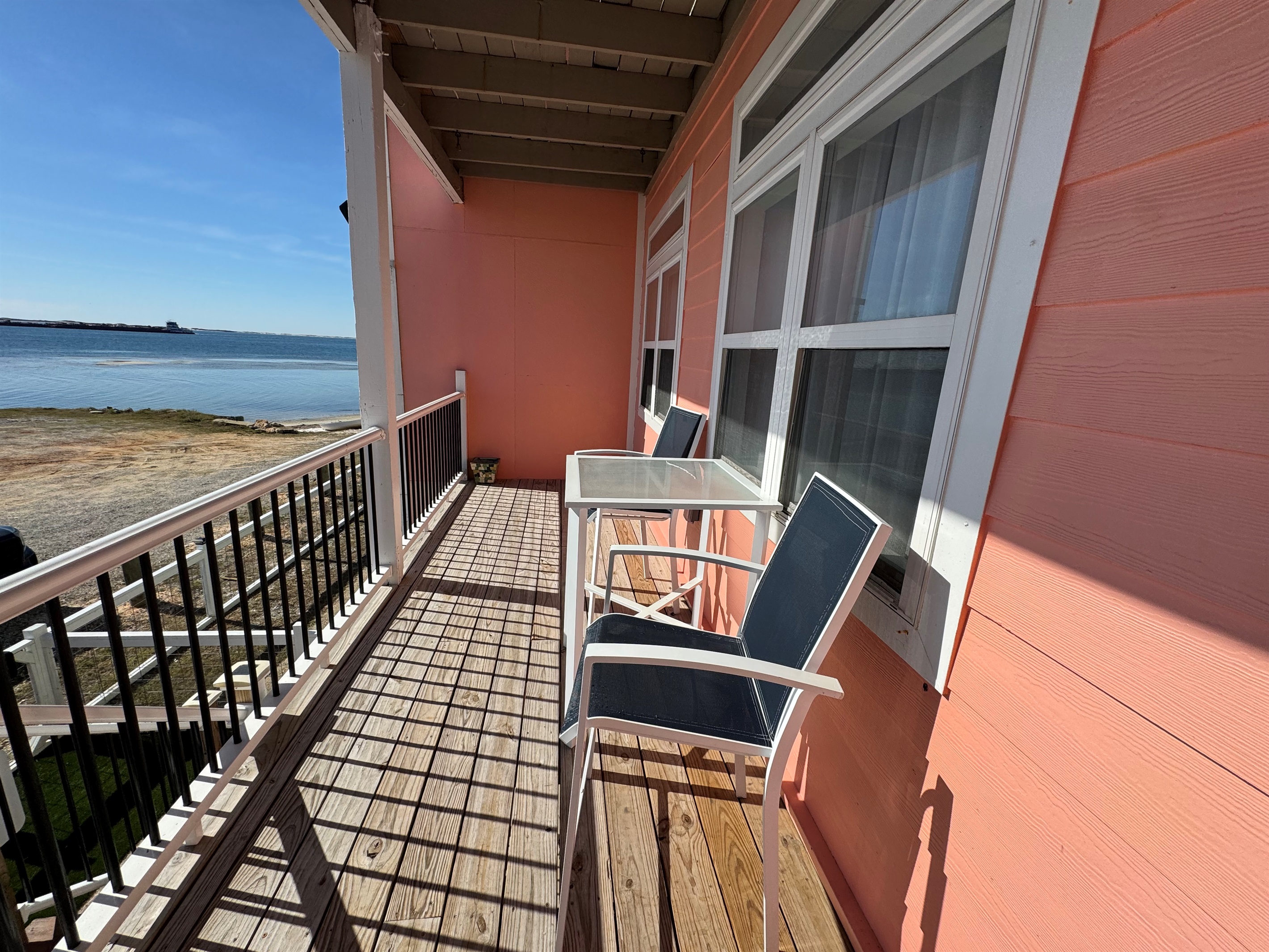 balcony with view of the marina, ocean and beautiful sunsets
