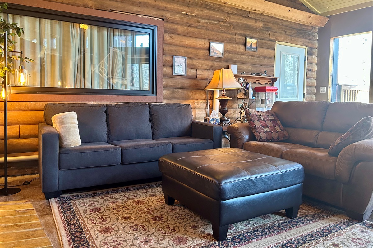 Window above couch can be curtained off or opened for for open line of sight to the Guest Quarters. The door to the Guest Quarters also has blinds that can be opened or closed for privacy.