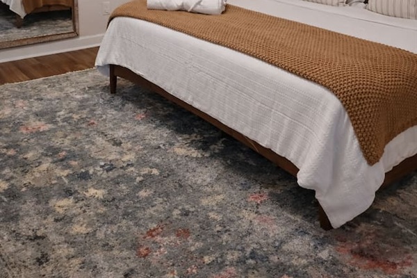 Comfortable bedroom with premium bedding designed for a restful night's sleep.