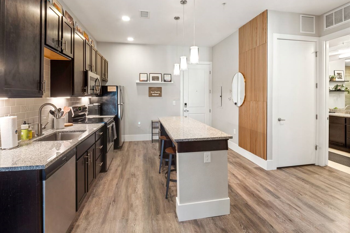 Spacious, open concept kitchen with everything you need for cooking! Keurig coffee maker. Pots, pans and baking dishes. Breakfast bar.