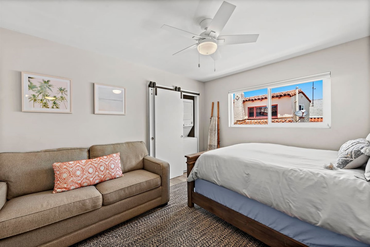 Our second bedroom has a queen bed and a very comfortable memory foam sofabed.  The plush rug in here also makes this room very comfortable for kids to play.
