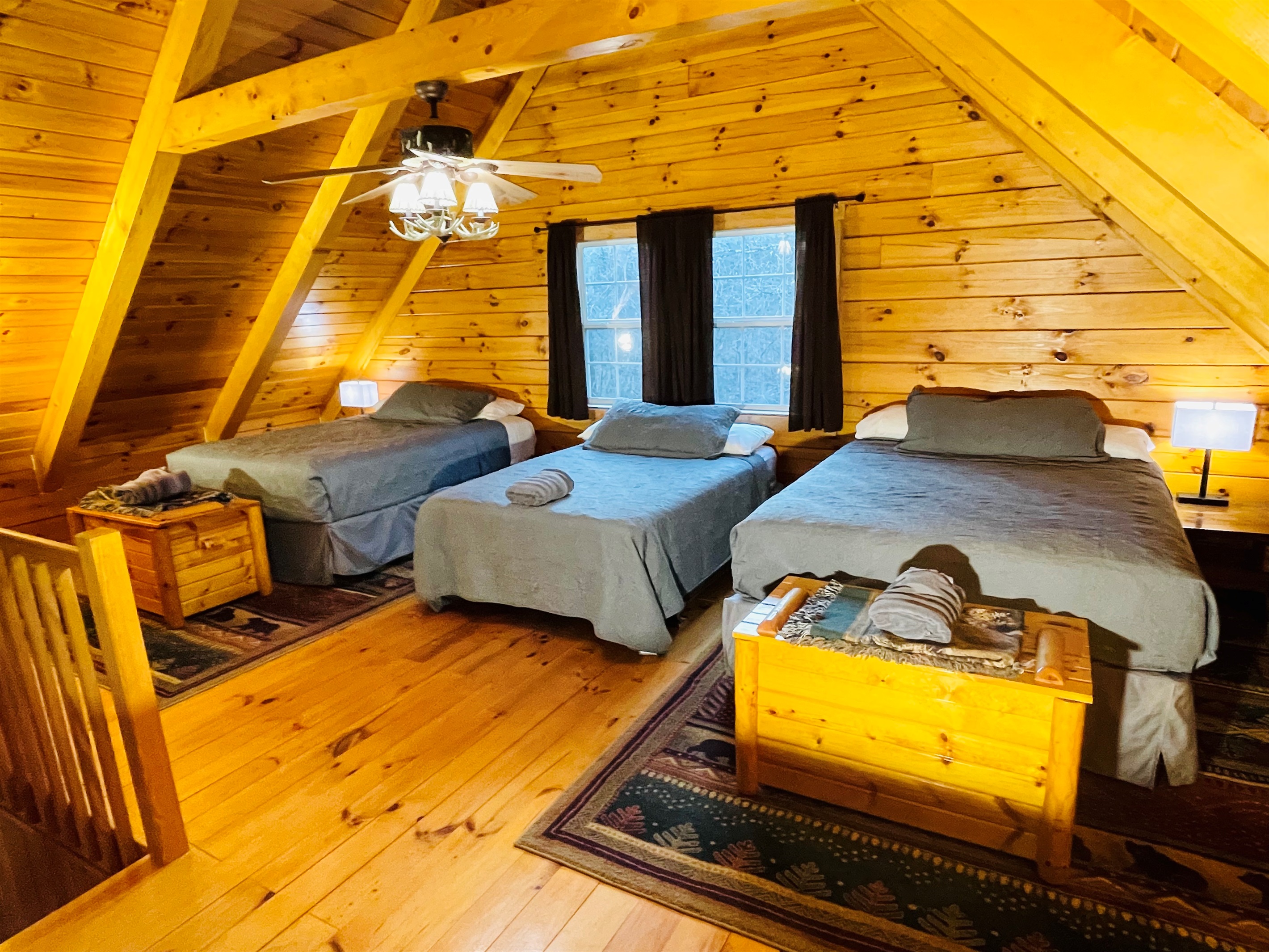 Loft Bedroom with two Queen beds and a Full bed.