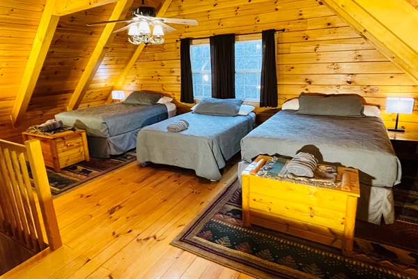Loft Bedroom with two Queen beds and a Full bed.