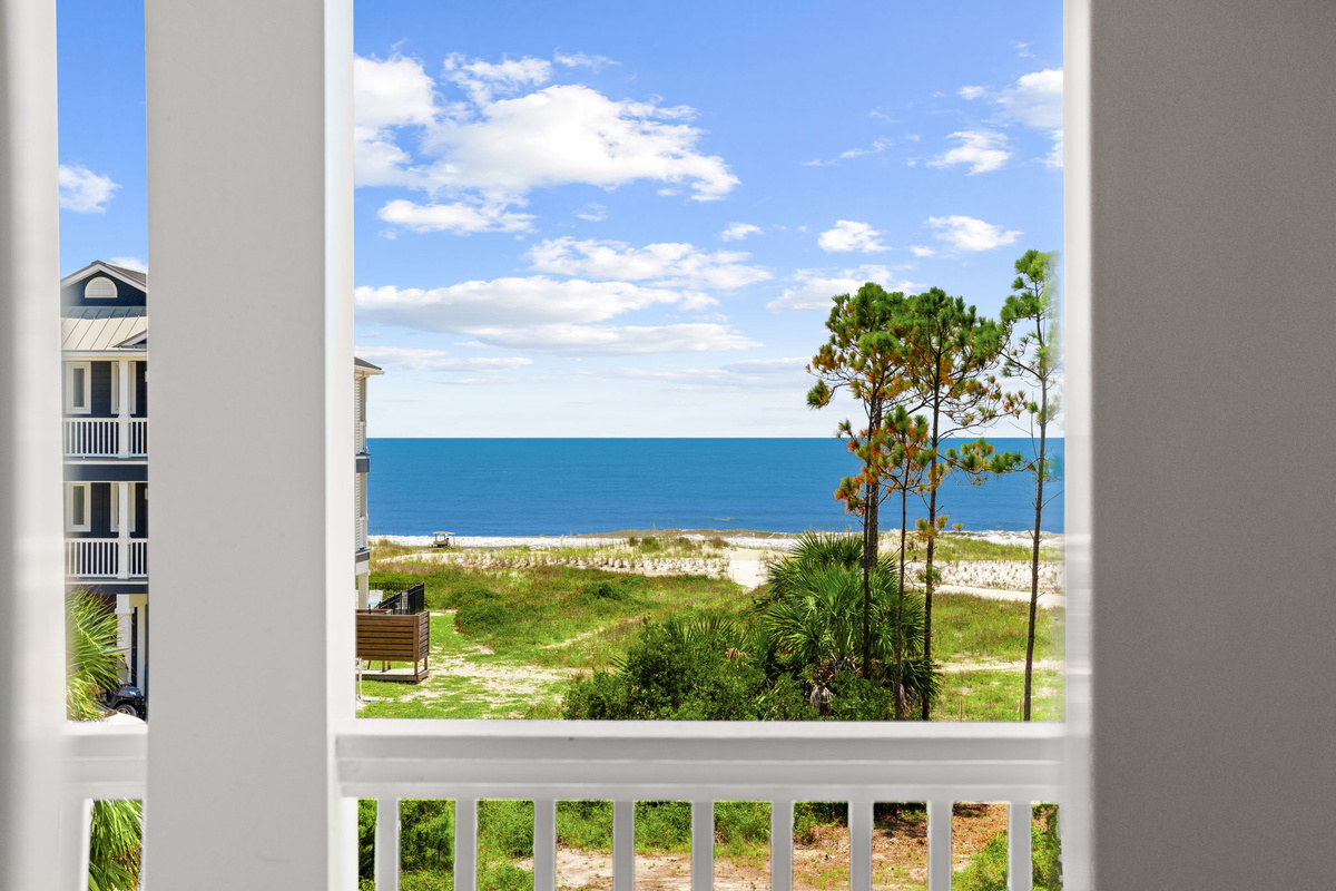 Just a short stroll to the beach - enjoy beautiful Gulf views from the comfort of your own balcony.