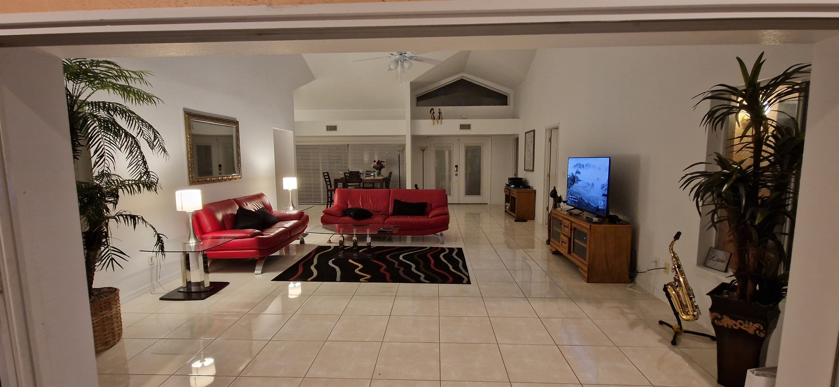View of Living room and front door from lanai