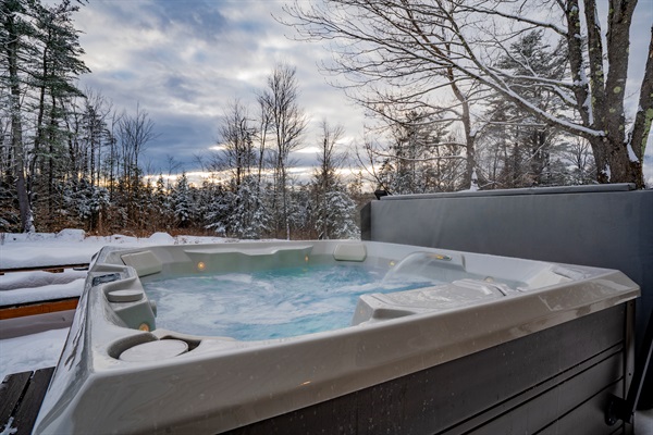 Warm up after a snowy day with a soothing hot tub soak