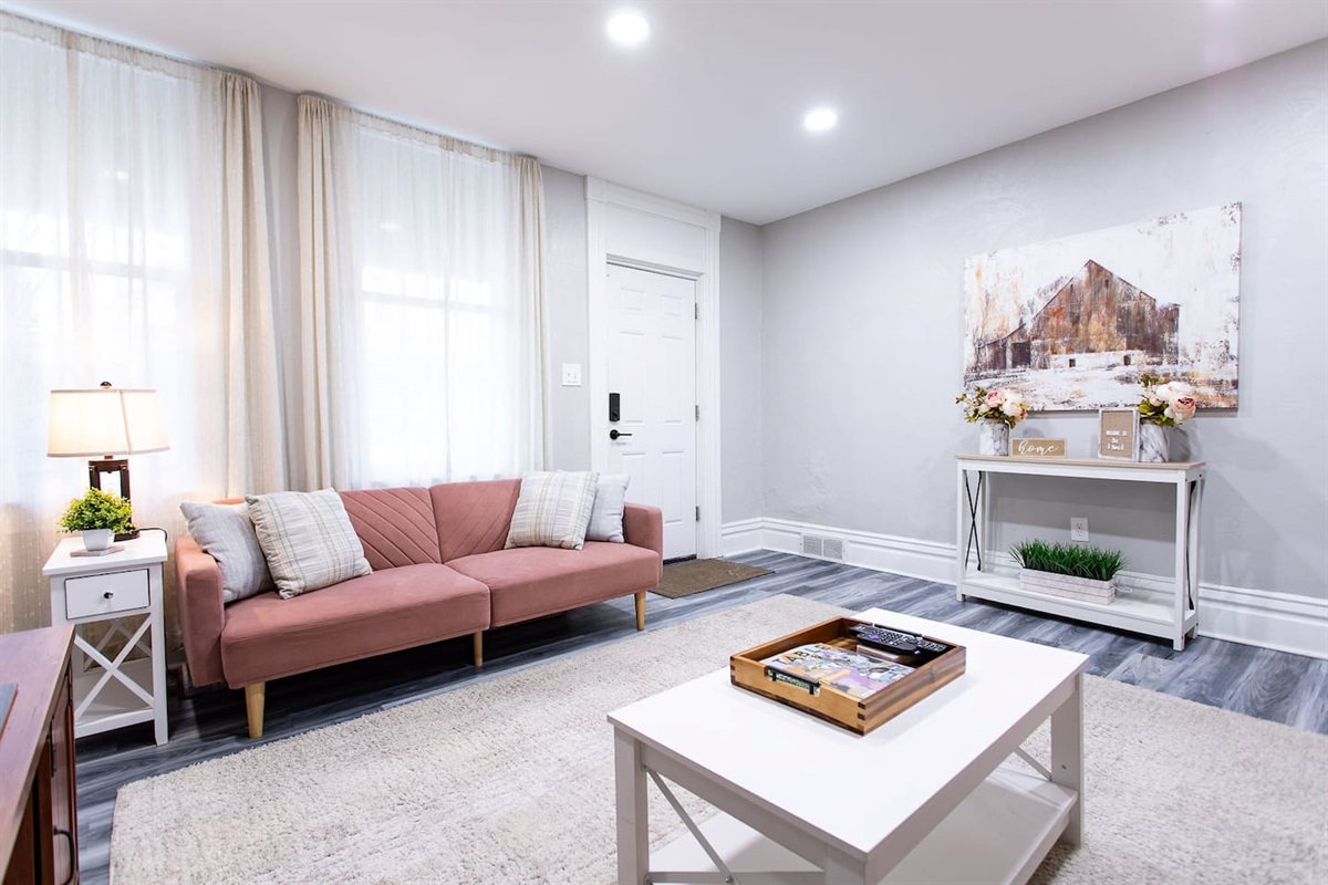Watch your favorite shows, movies, and sports on the living room 55” ROKU smart TV, accessing local channels via antenna and popular streaming channels with your own log-ins.