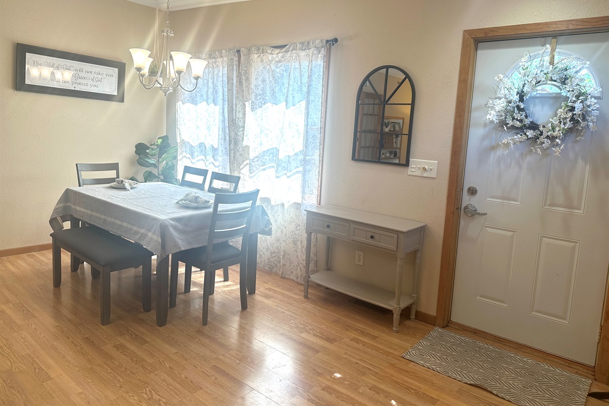 The front door leads out onto the large deck with intermittent views of Lake Pepin.