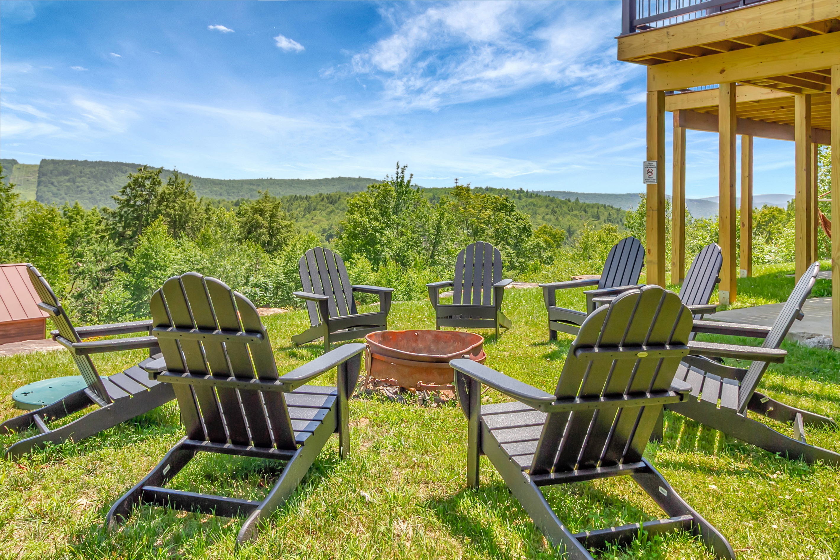 Beautiful fire pit area with seating for 8+