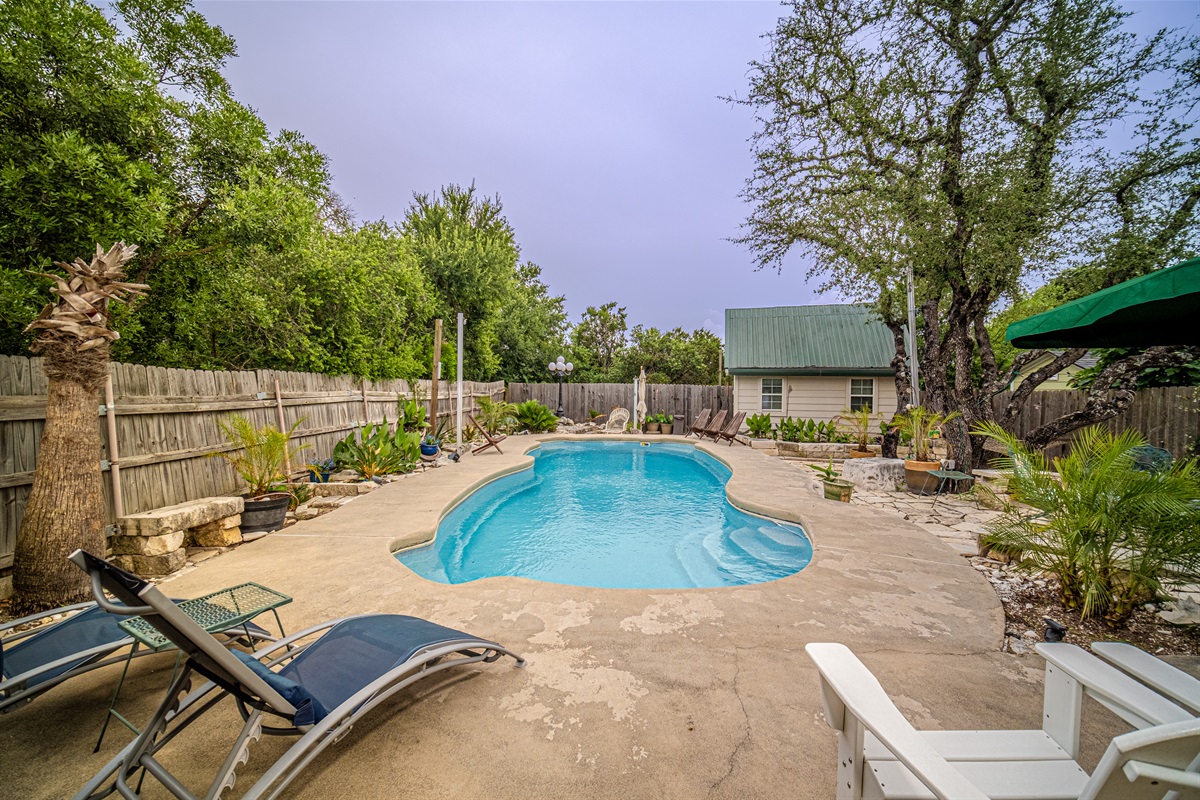 Totally private, heated pool w/ Aquarite natural chlorinator for silky smooth water without the irritation of chemicals. Bench seats with spa jets and waterfall. Surrounded by palm trees & natural stone patio.. Skinny dipping allowed!