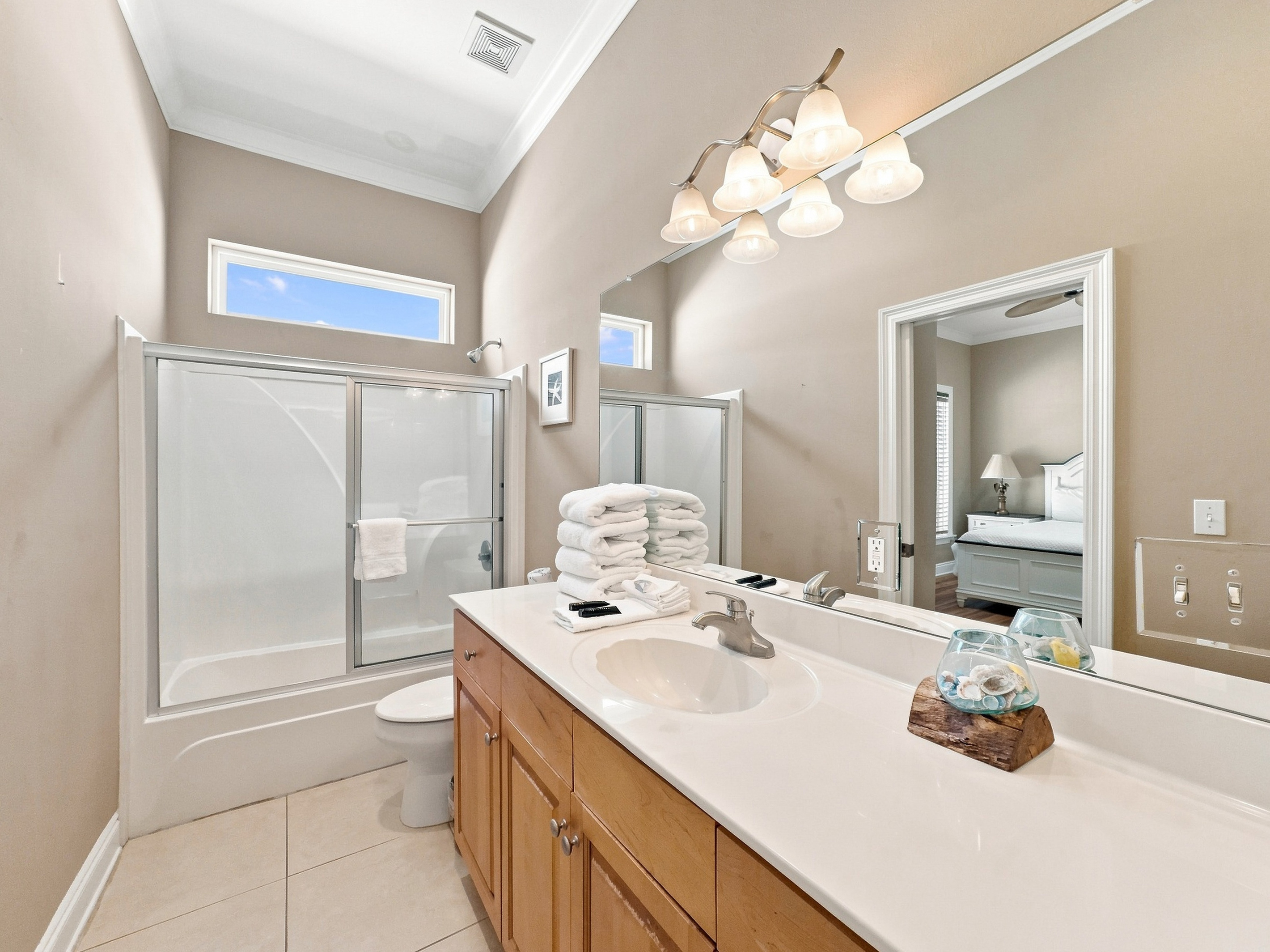 Bathroom with a walk-in shower and single vanity
