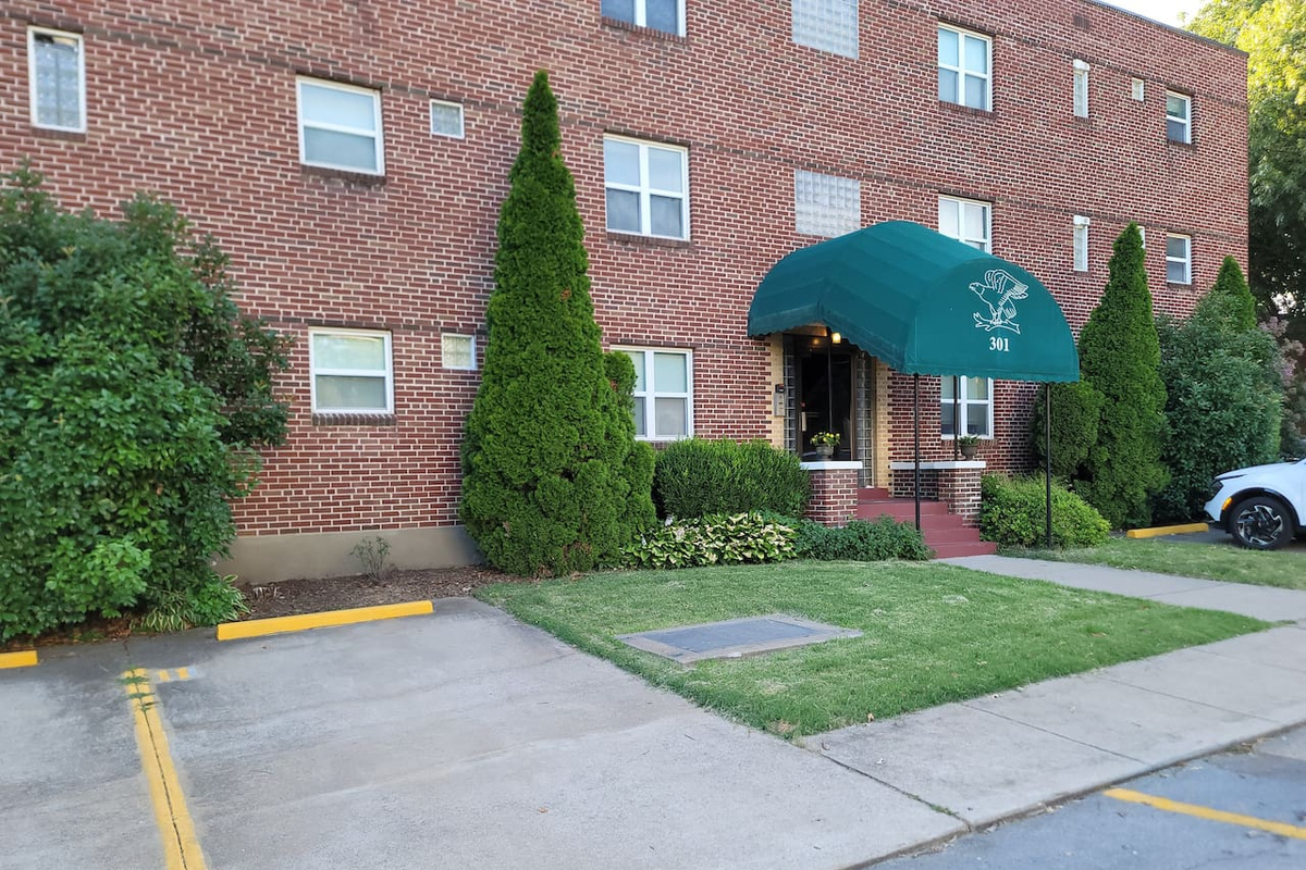 Your parking spot is #11 just next to the front door of the building.