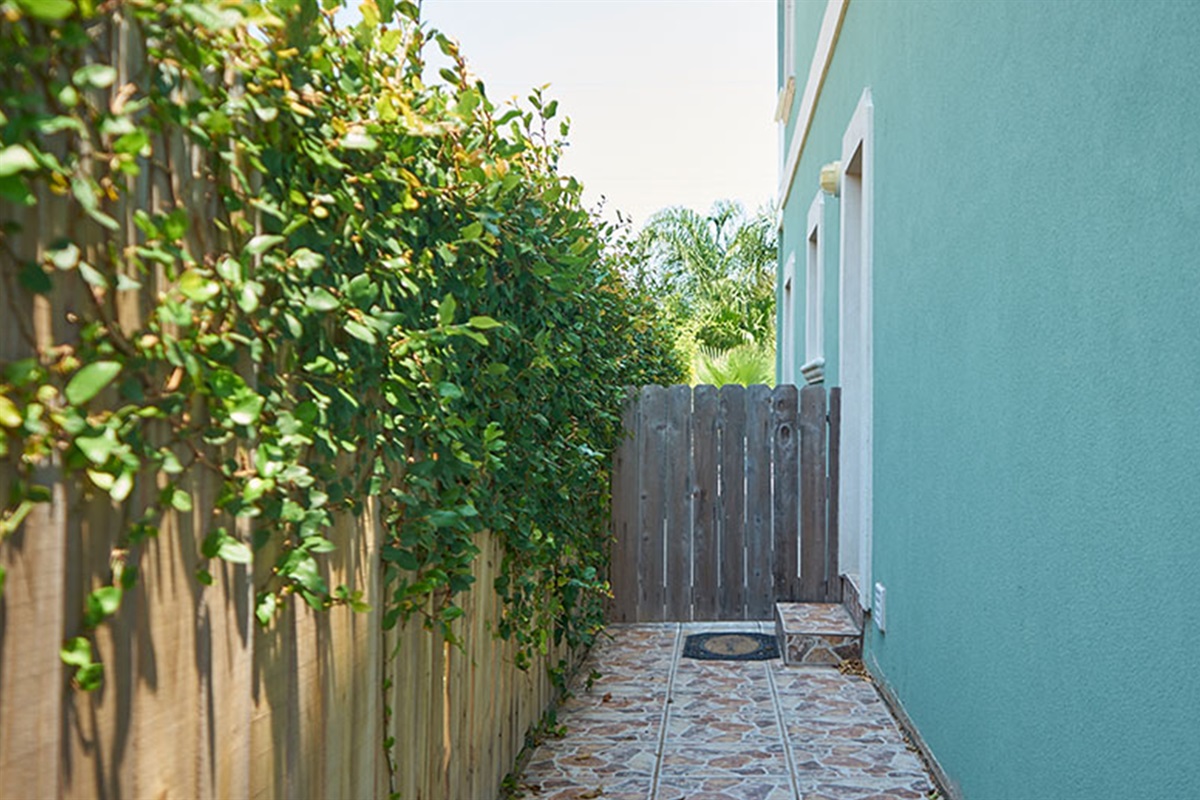 Access entrance on left hand side of the building