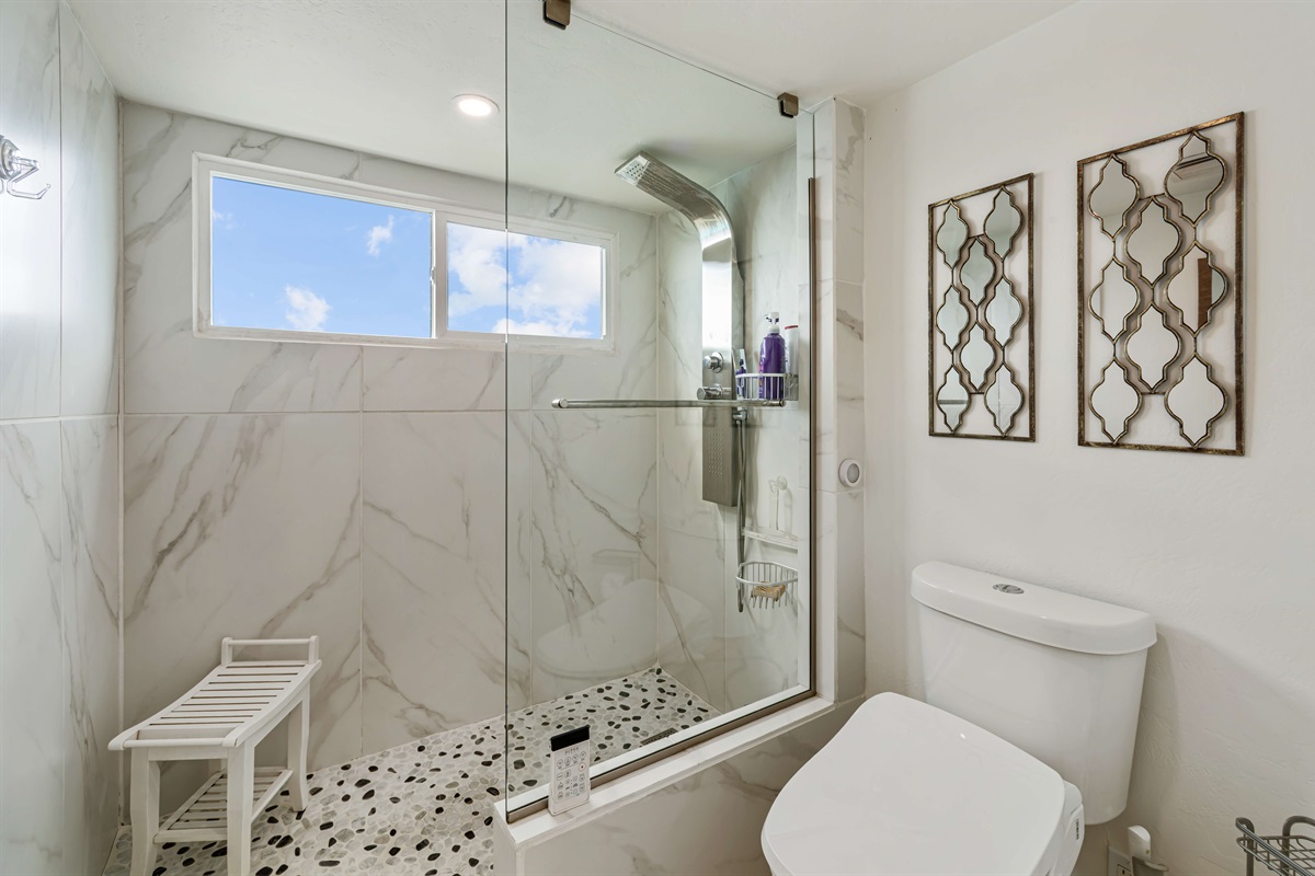 Ensuite bathroom with double sinks just off the primary bedroom